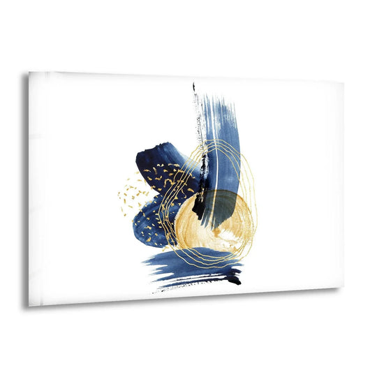 The edge of this blue and gold abstract glass art showcases a clean, white border with subtle shadow casting.