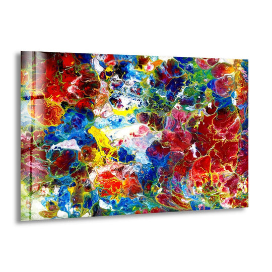 Sunlight illuminates a vibrant abstract glass wall artwork, casting dynamic shadows through swirling red, blue, and yellow hues.