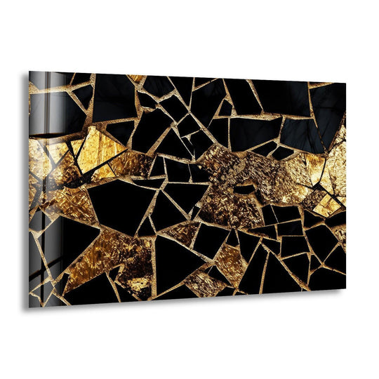 Dark, fractured black marble mosaic art with shimmering gold accents, a striking piece of hanging wall art.