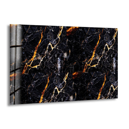 Black and orange marble veins create a striking visual rhythm in this abstract glass wall art.