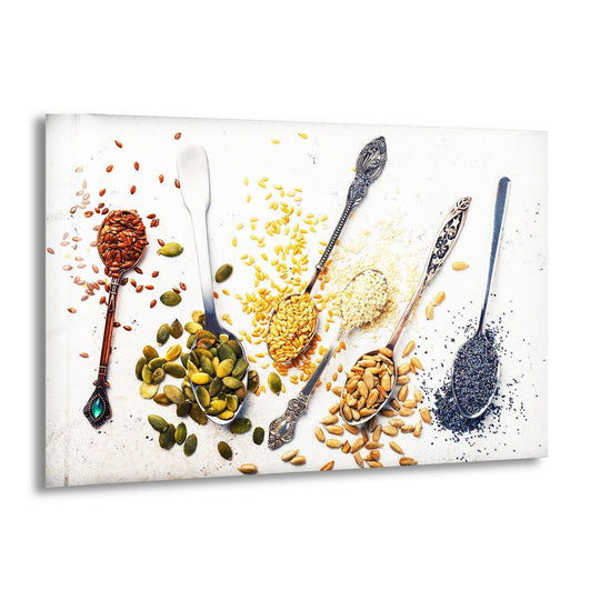 Horizontal glass wall art depicting vintage spoons filled with colorful seeds and spices on a white surface perfect for kitchen decor.