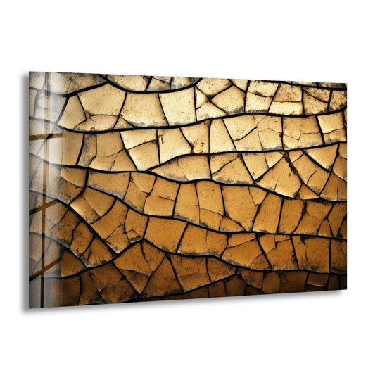 Geometric cracks in a gradient of brown and yellow tones create a mosaic effect on this glass wall art.