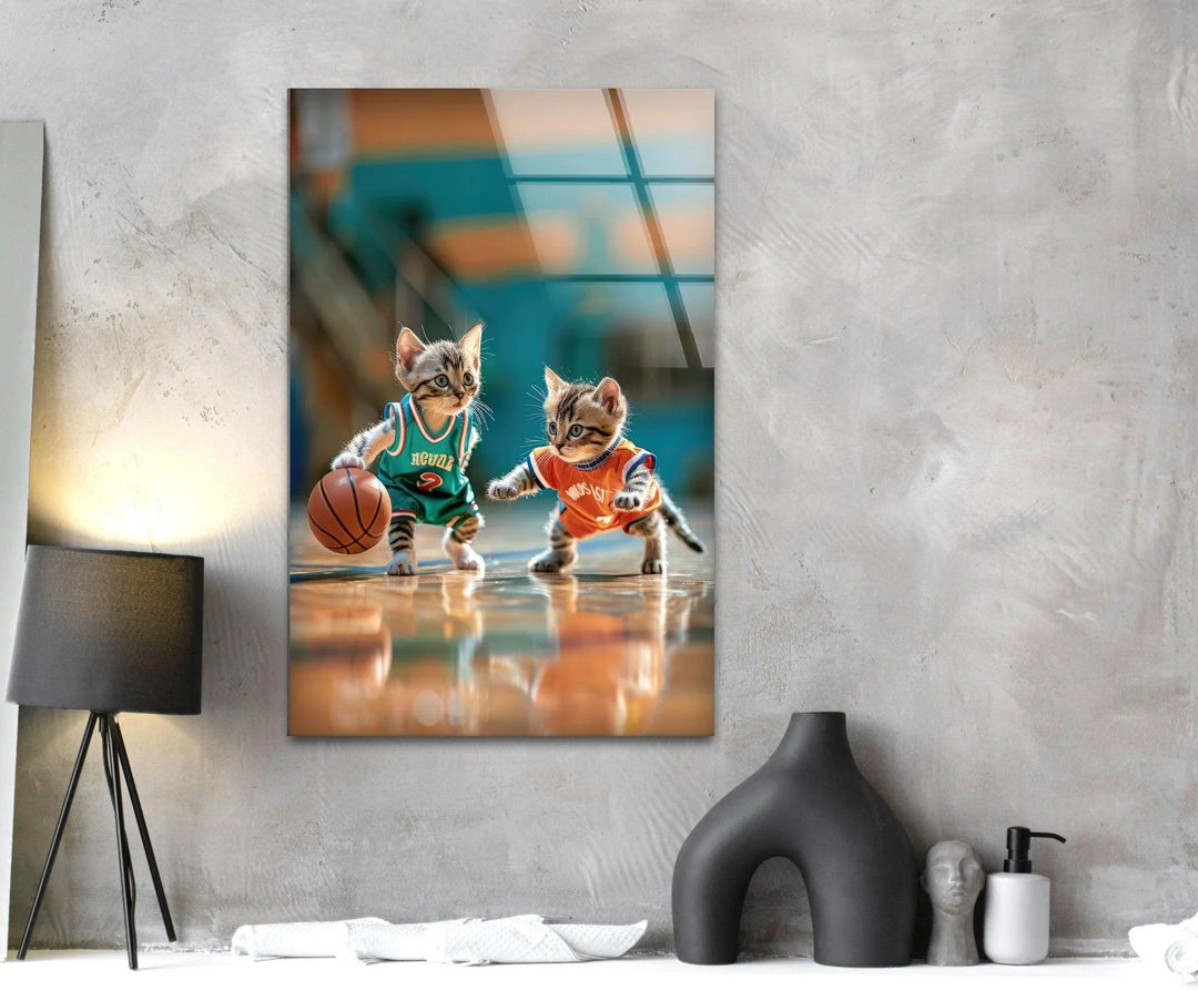 Adorable glass print of kittens dressed as basketball players in action on a bright court.