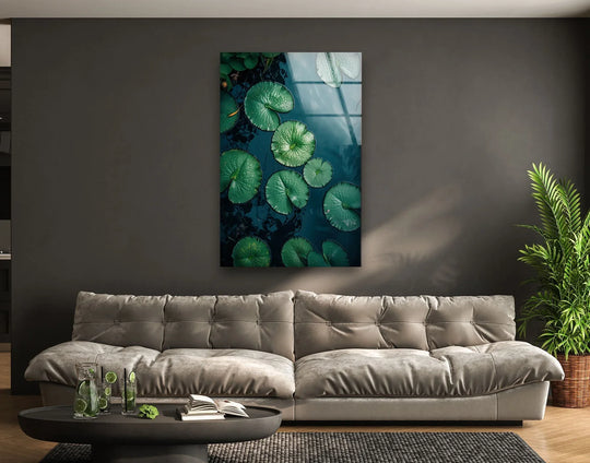 Abstract green lily pads float on a dark, reflective surface, creating a serene hanging wall art.