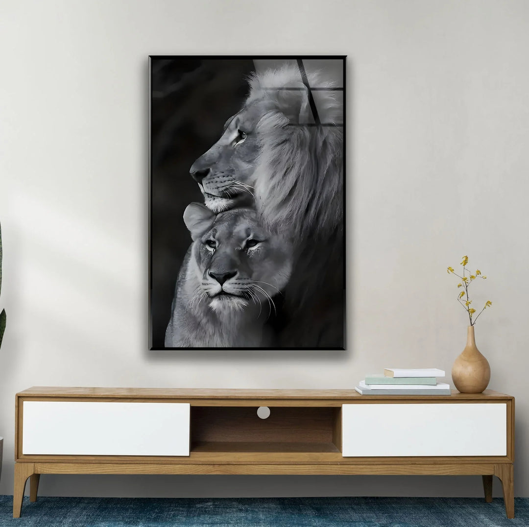 Black and white lion duo artwork emphasizing emotion and unity on glass.