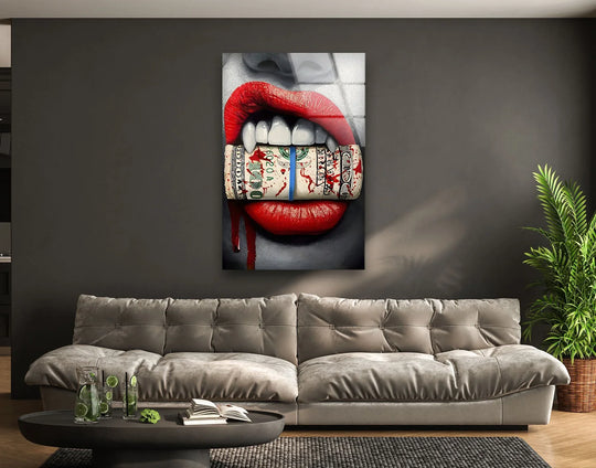 A soft, plush gray tufted sofa anchors the room, complementing the bold glass wall artwork.