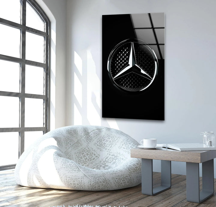 Modern monochrome glass artwork showcasing a polished star symbol with deep glossy black background.