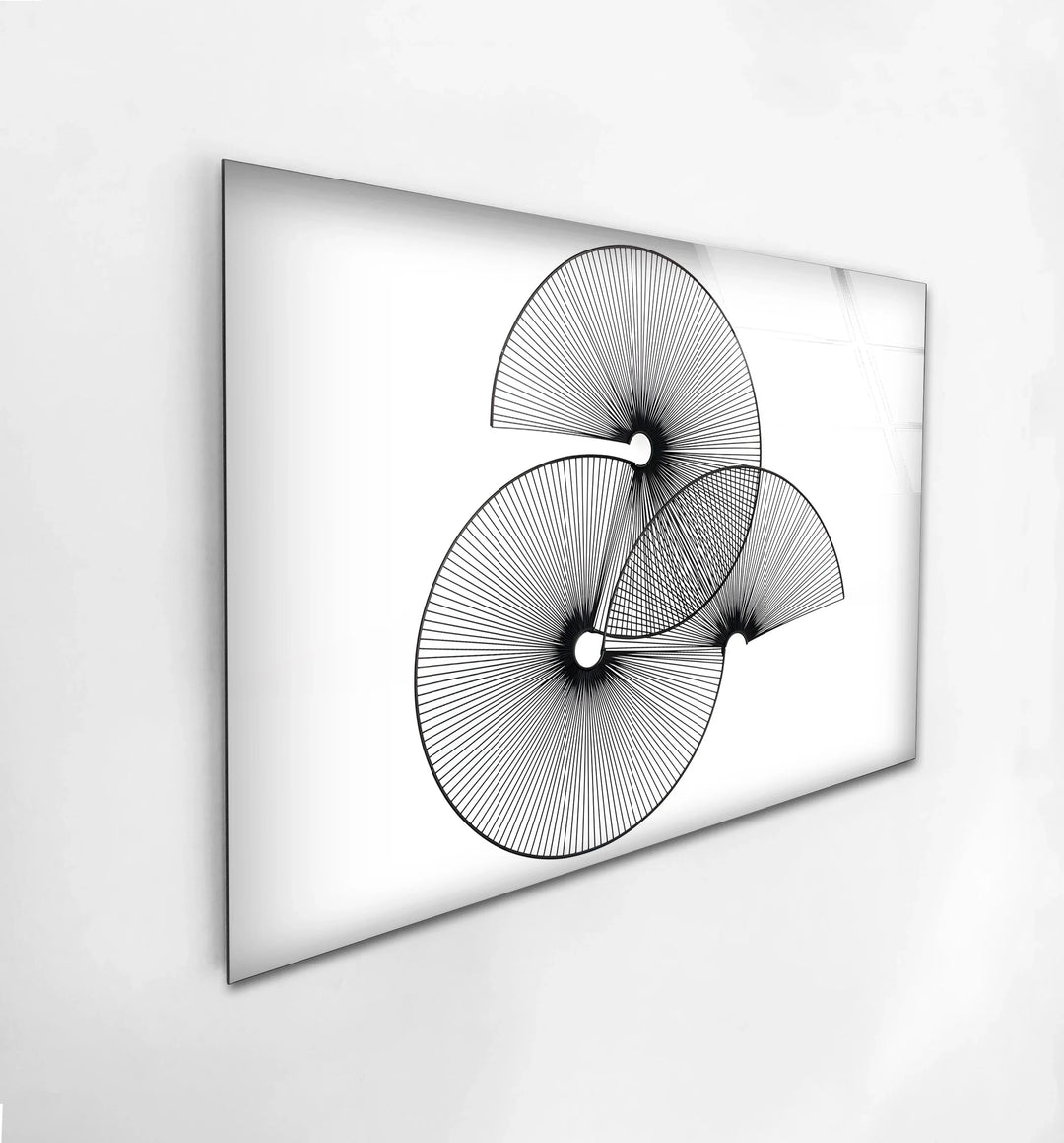 Minimal black line spiral art with three circular geometric forms.