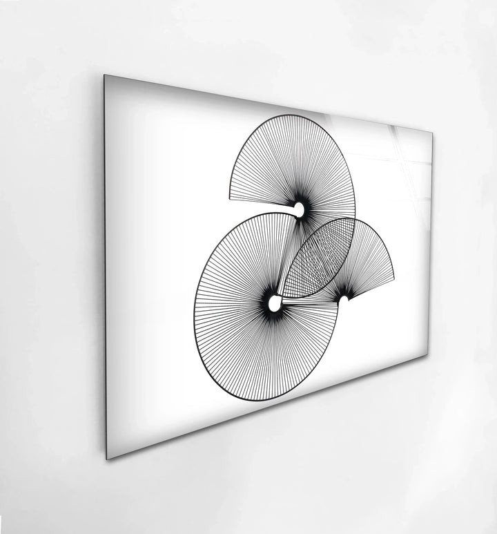 Minimal black line spiral art with three circular geometric forms.