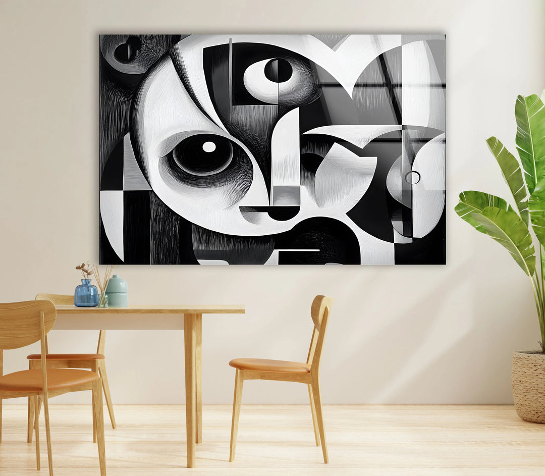 Black and white cubist wall art featuring expressive eyes and fragmented geometric patterns.