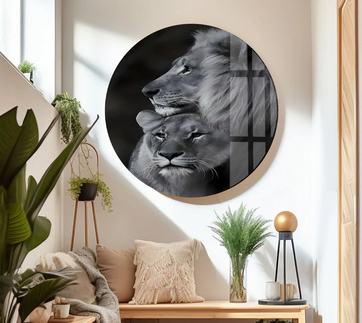 Monochrome lion couple artwork on glass showing a protective lion beside a serene lioness.