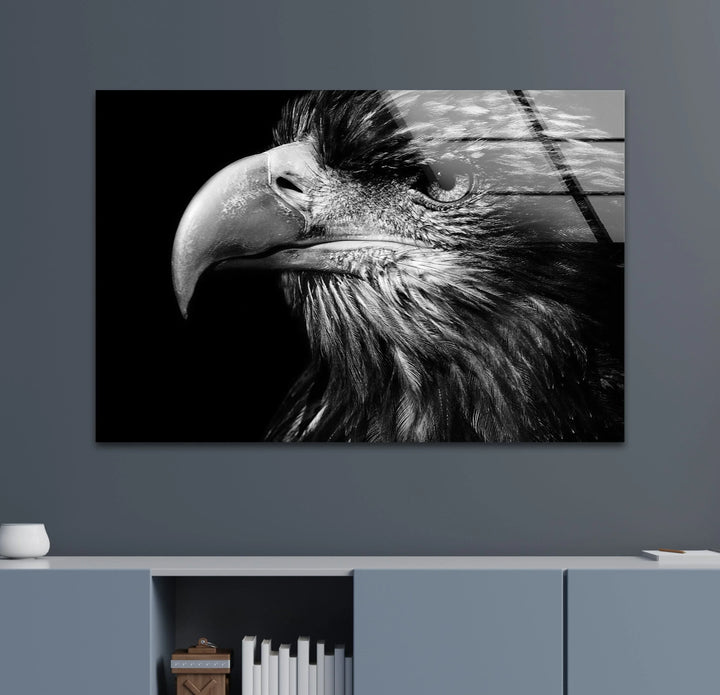 Realistic eagle head with dramatic shadows and crisp feather details on glass art.