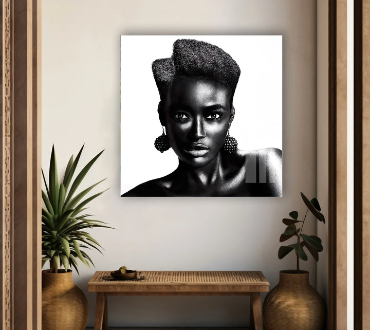 Striking artistic portrait of a woman with geometric hairstyle displayed on glass wall art.