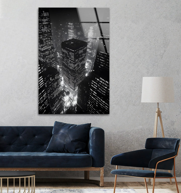 Monochrome glass art featuring a dramatic aerial view of a bright cityscape.