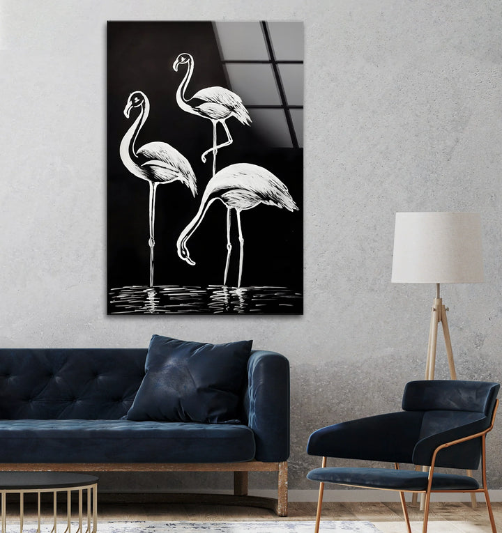 Minimalist monochrome glass wall art showing three flamingos with graceful line details.