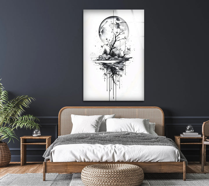 Dreamlike black and white artwork on glass featuring a tree silhouetted against a large moon.