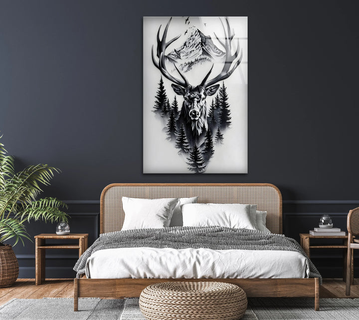 Majestic stag illustration on glass with layered trees and towering mountains in black and white.