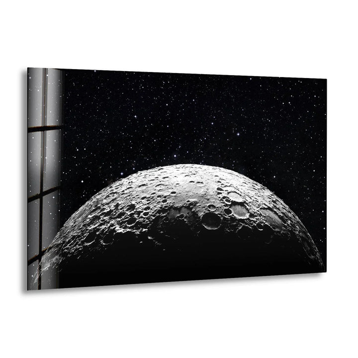 Detailed black and white glass wall art featuring the moon’s cratered surface against a starry night sky.
