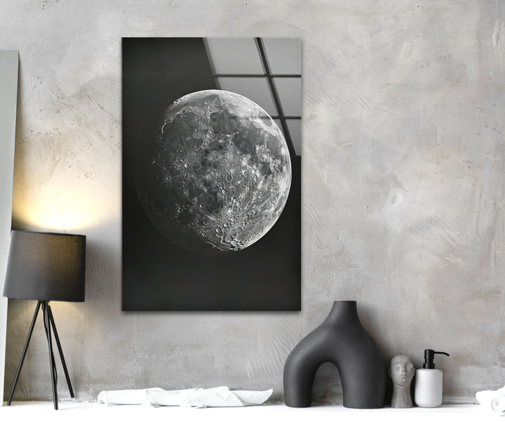 Artistic lunar close-up printed on glass featuring intricate crater patterns and surface structure.