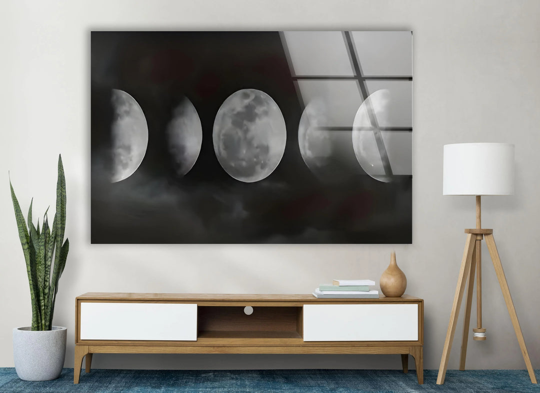 Monochrome celestial composition on glass with lunar details framed by misty shadows.