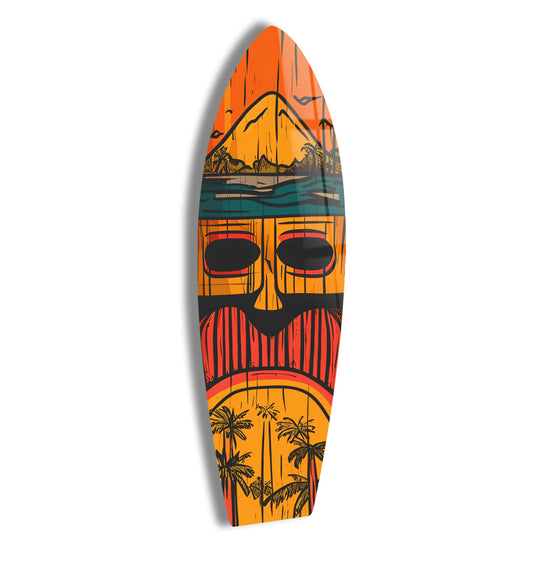 A surfboard with a tiki design casts a soft shadow, showcasing warm orange and yellow hues and rich, dark accents on its surface.