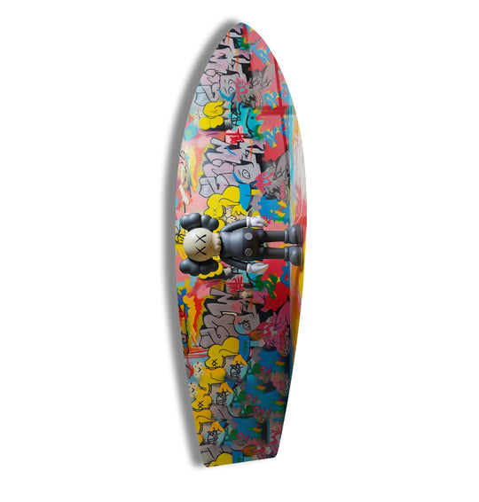 The surfboard features urban street art and a colorful figurine design and this surfboard wall art makes a statement with its bold and unique design and pop art style