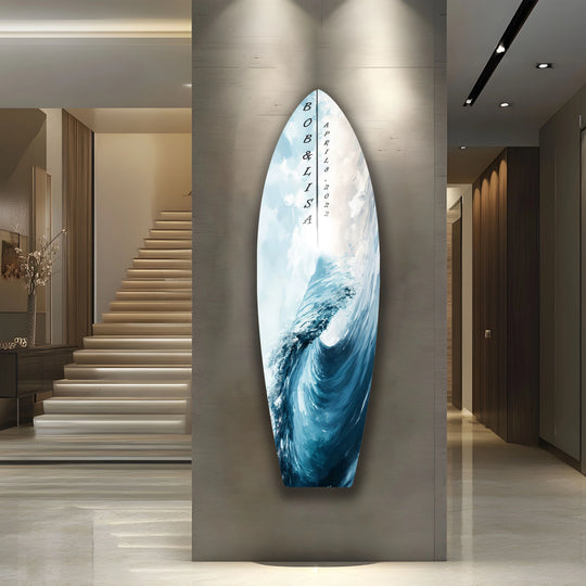 A modern hallway with beige walls and travertine flooring frames customizable surfboard art, highlighting the potential for personalized glass photos prints within a sophisticated home decor setting.
