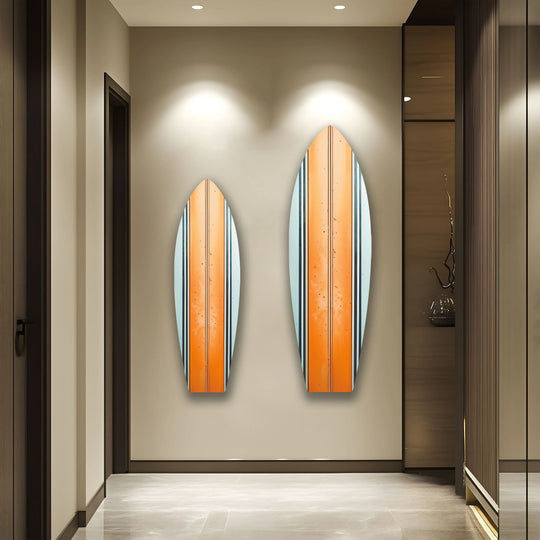 The smooth transition between the cool white and warm orange colors highlights the sleek design of this glass art painting featuring striped surfboard wall art.