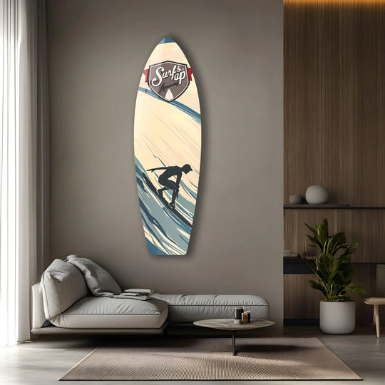 A silhouette of a surfer rides a dynamic wave, captured in striking glass art that conveys thrilling movement.