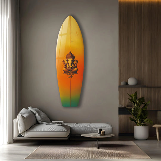 The glossy finish of this surfboard featuring Hindi Buddha art creates a reflective hanging wall art piece perfect for adding a touch of serenity.