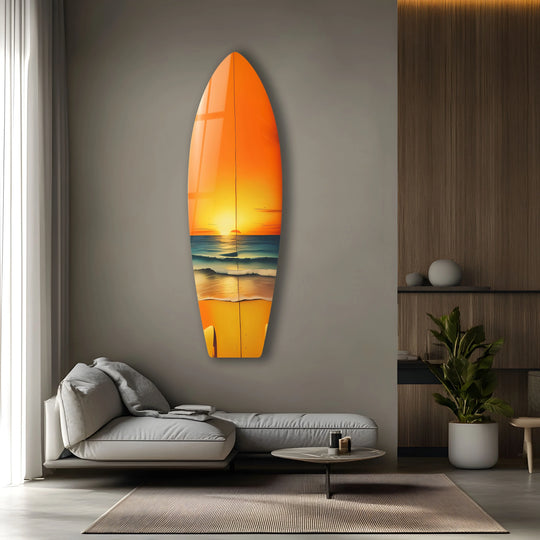 Surfboard wall art with a beach sunset motif and orange color is golden sunset decor and coastal beach art for surf lovers