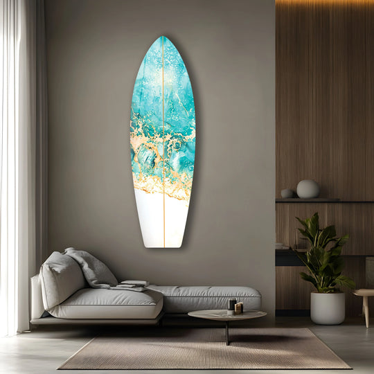 Abstract glass print wall art showcases a vibrant transition from sapphire blue ocean waves to a crisp white shore with gold accents.