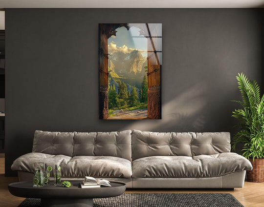 Sunlight and shadow define the mountainous landscape view in this hanging wall art, creating depth in the open door glass art piece.