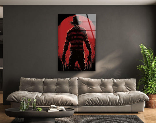 Smooth surface texture of the dark clawed shadow figure glass wall artwork highlights the reflective sheen against the bold red backdrop.