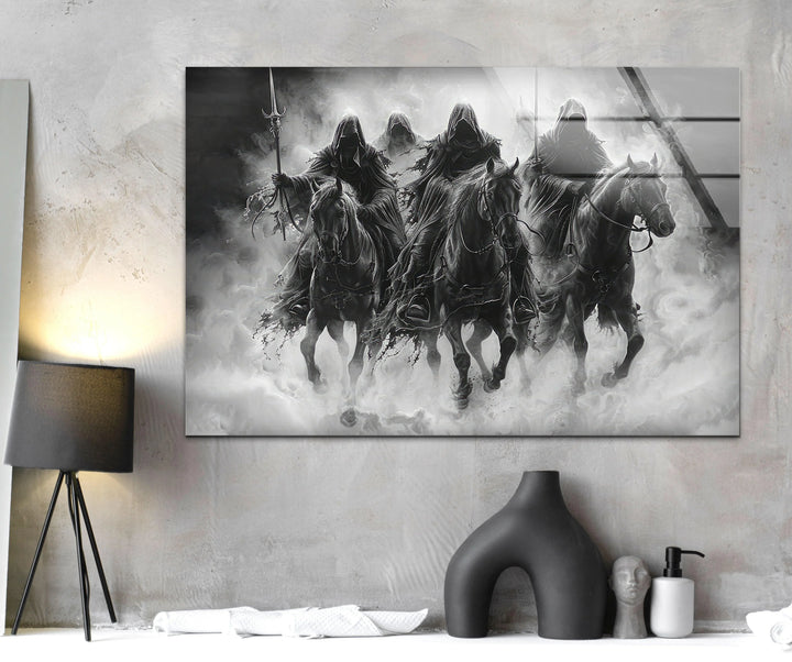 Glass wall art highlighting dark riders on horseback surrounded by billowing fog and motion.
