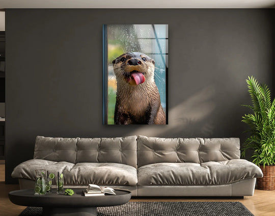 Minimalist decorative wall art features a playful otter with its tongue out against a muted, dark background with ample negative space.