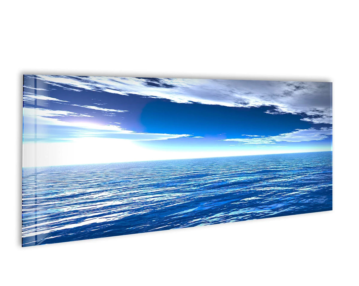 The fluid, organic forms of the ocean and sky create a mesmerizing landscape, showcasing beautiful glass wall art decor in an expansive panoramic view.