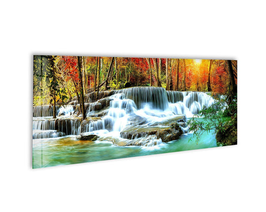 Nature Landscape glass wall art showcases a cascading waterfall and vibrant autumn trees and offers serene panoramic landscape decor for a calming statement wall