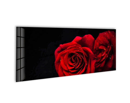Red Rose Drops glass wall art features vibrant red roses and water droplets and is a romantic floral decor piece and modern wall decor and panoramic design