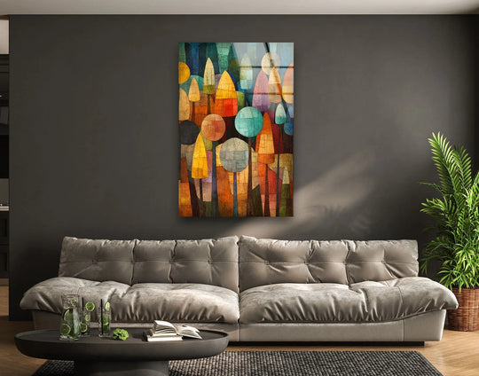 Abstract forms transition from rich ochres to deep blues and teal in this vibrant glass art painting.