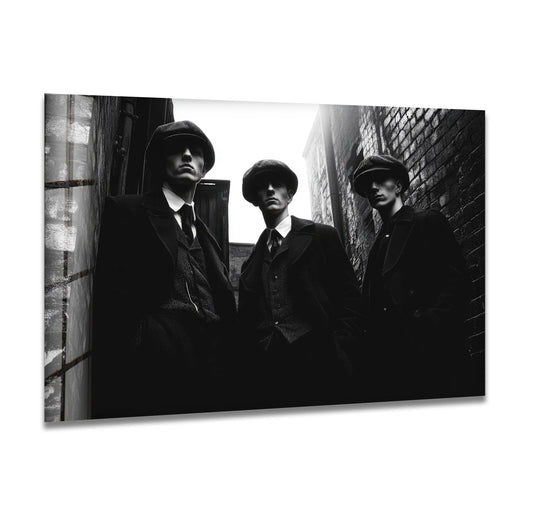 Transitioning shades define this vintage alley gentlemen portrait, a striking glass wall artwork that presents a dramatic urban scene in monochrome tones.