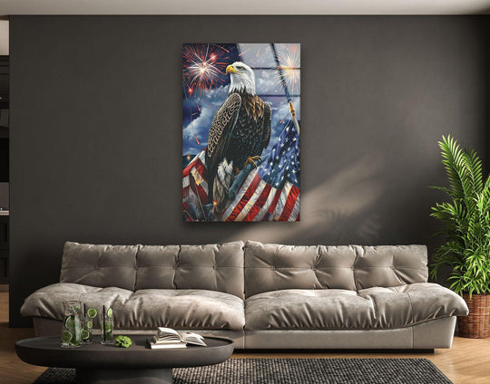 A majestic eagle perches stoically on an American flag against a backdrop of distant fireworks, captured in serene glass art.