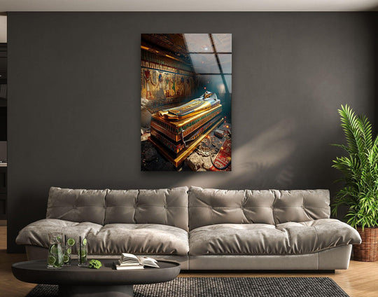 A golden sarcophagus within an Egyptian tomb showcases vibrant color contrast against the dark interior in this print wall art.