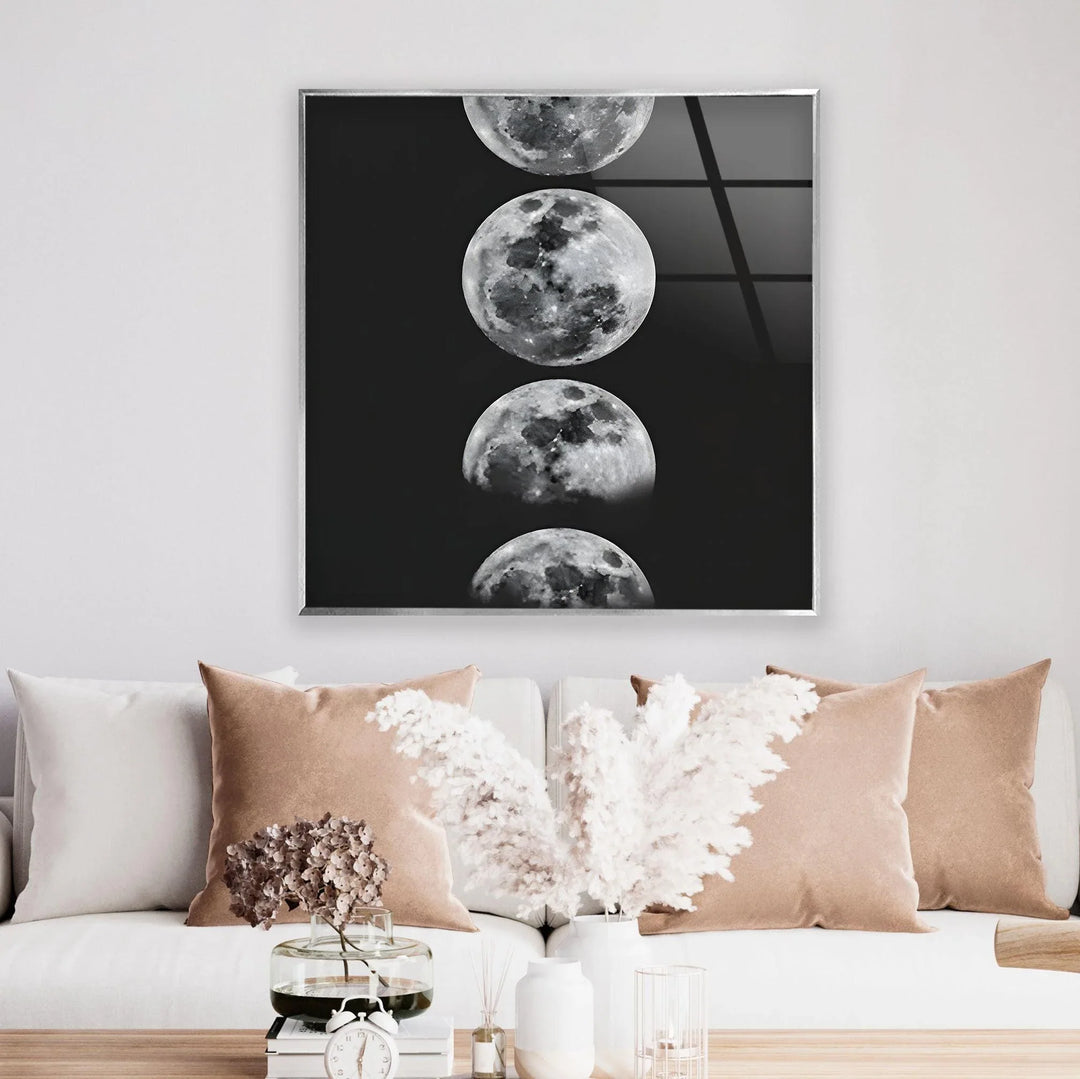 Modern celestial glass art displaying sequential moon phases with sharp monochrome contrast.