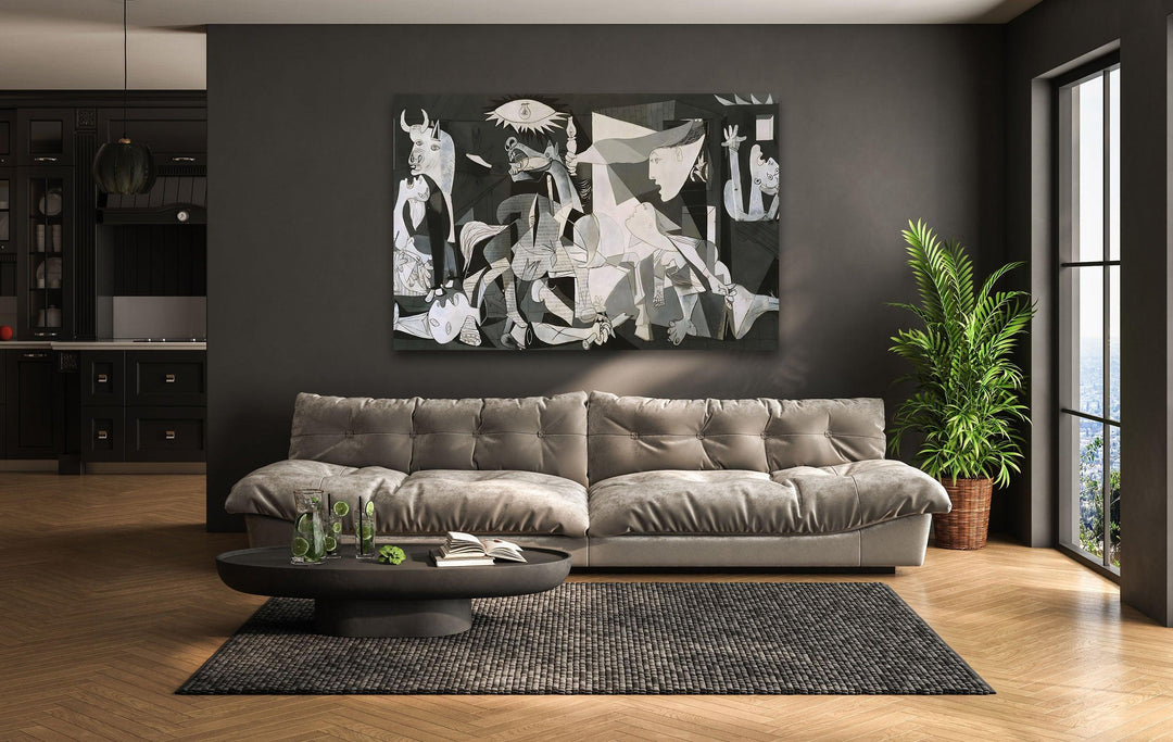 Modern glass wall art inspired by Picasso’s Guernica showcasing fragmented forms and expressive monochrome symbolism.