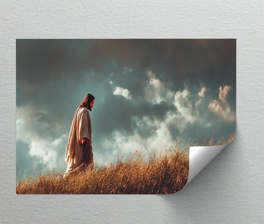 Light and shadow define the scene of the 'Walking in Faith – Jesus in the Wilderness' hanging canvas, where dark clouds accentuate a figure walking through a field.