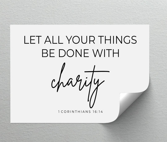 The 'let all your things be done with charity' text is the central subject of this big canvas prints art, offering a minimalist design with a scripture verse.
