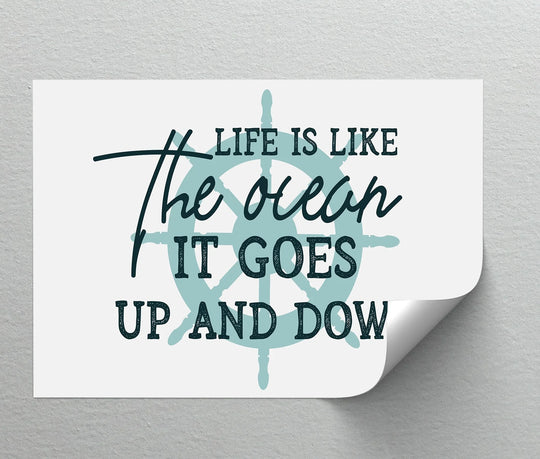 Dominated by a light blue hue, the big canvas prints feature a nautical quote design with the words 'Life Is Like the Ocean' above a ship's wheel.