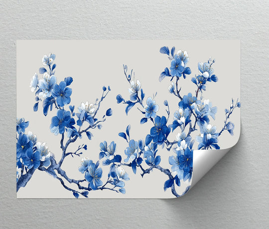 Repeating blue blossoms and leaves create a tranquil visual rhythm in this cherry flower branch canvas print, offering a captivating take on the best canvas prints.