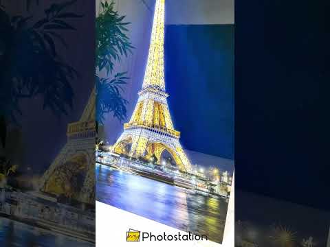 Torre Eiffel di notte: punto di riferimento luminoso su Quadri da Parete in Vetro